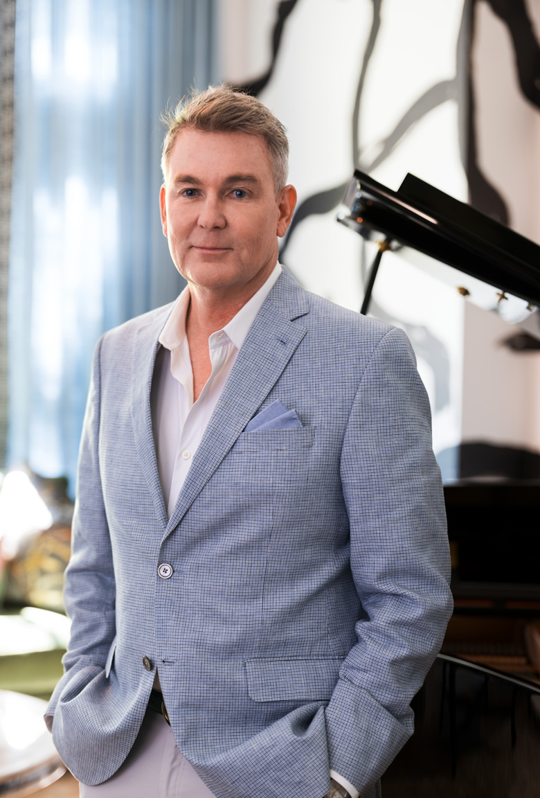 robert moseley in blue and white suit